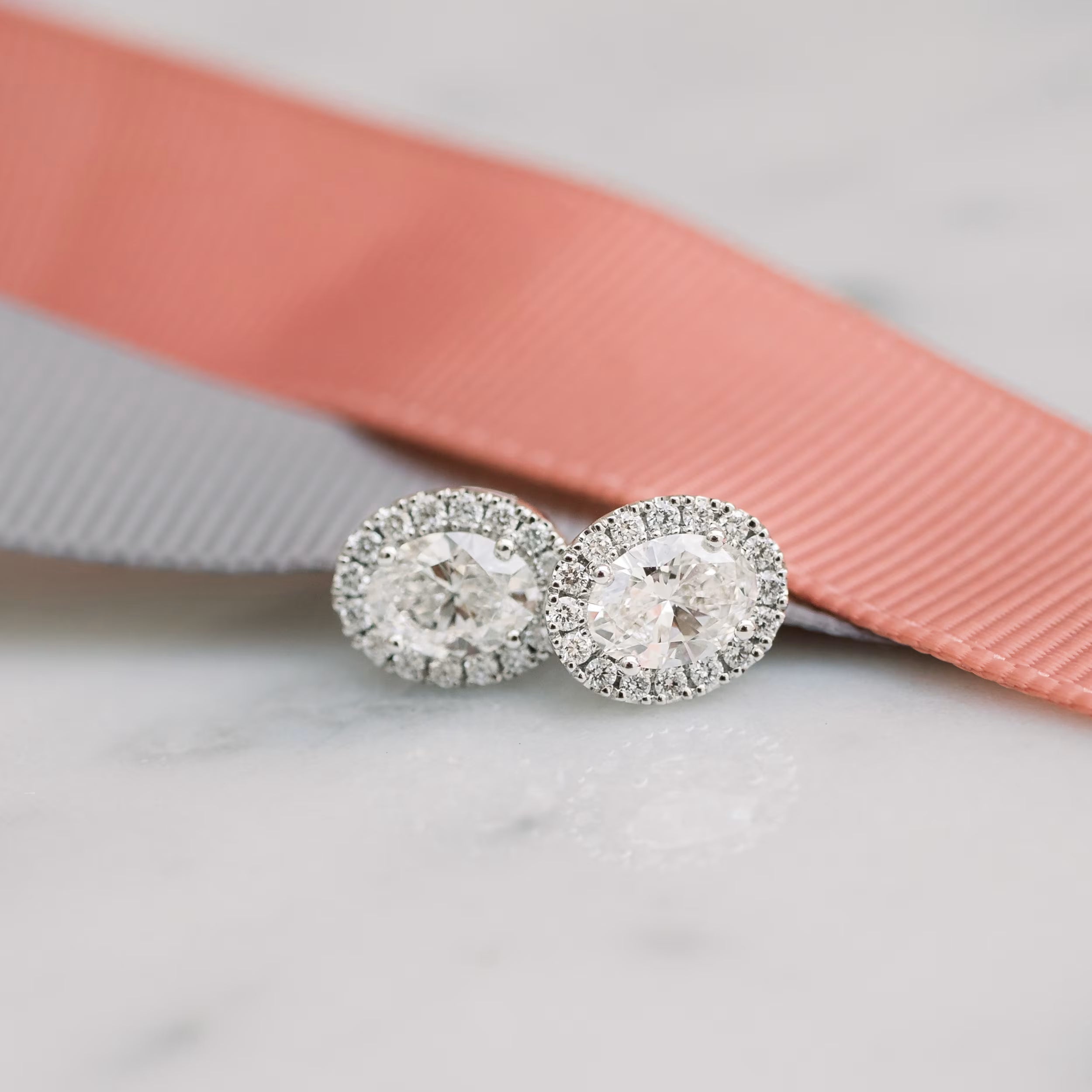 1.50 TCW Oval Shape Moissanite Halo Stud Earrings in Gold 1